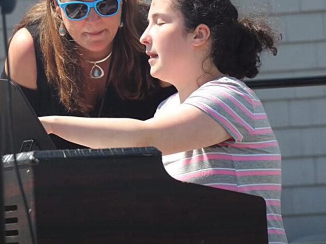 Student plays piano in Campus Talent Show